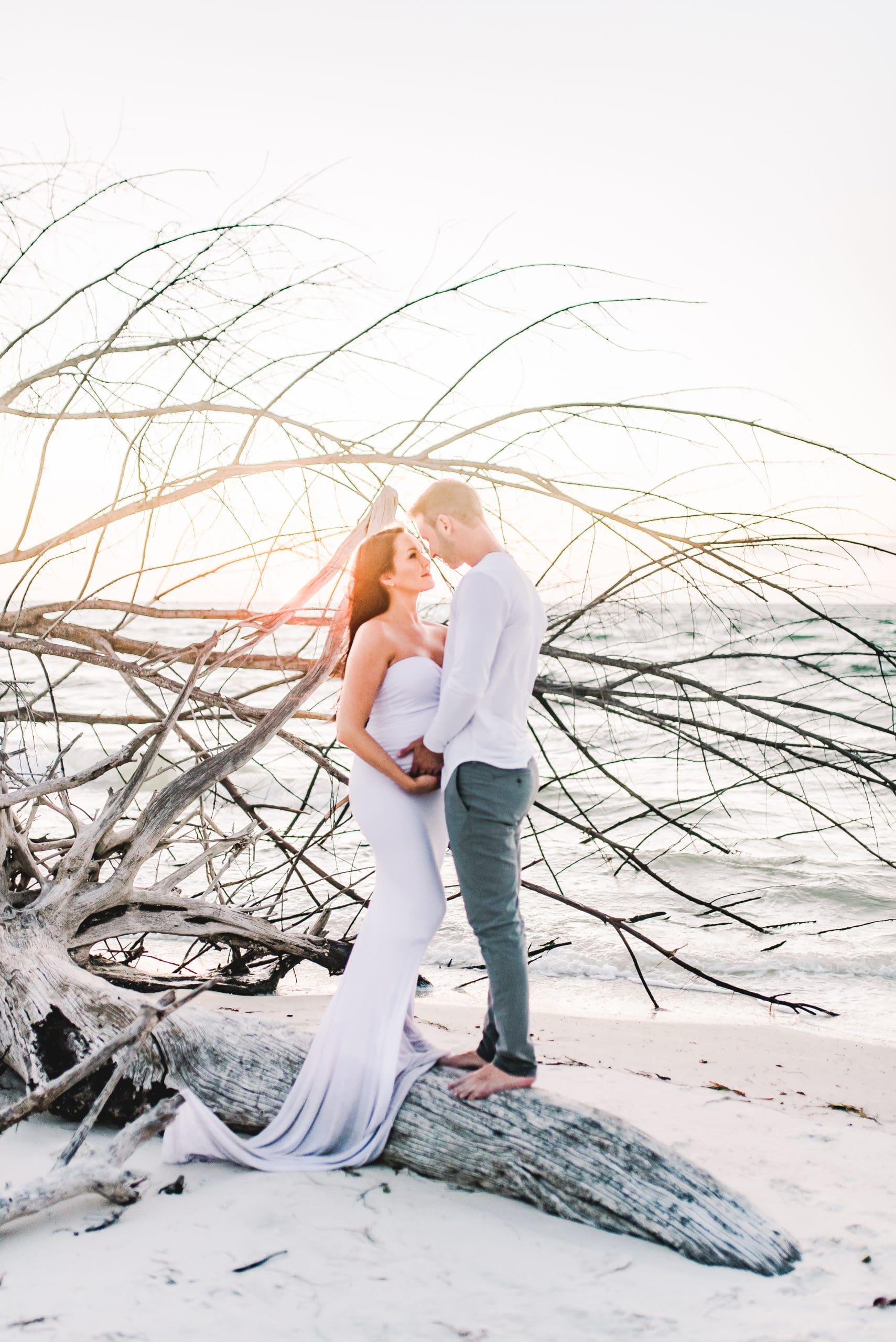 Driftwood Beach Maternity Sunset Session | Golden Hour Perfection